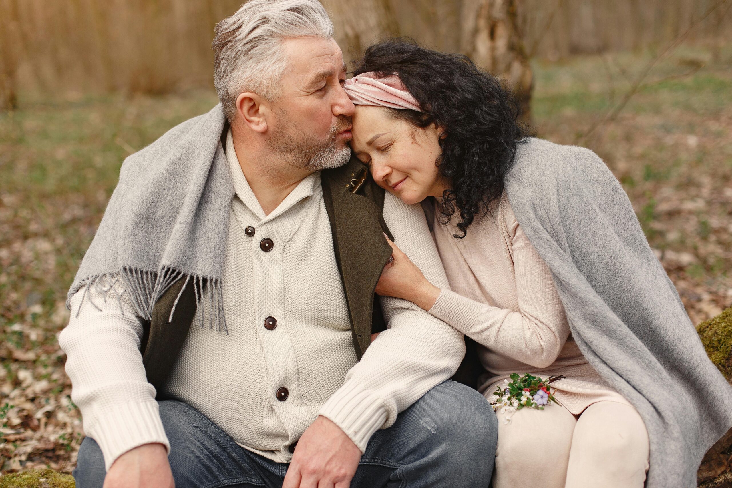 A senior couple in North Carolina smiling and feeling secure after learning about the simple 3-step process to get life insurance from YourFEX.com.