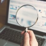 A person carefully choosing a life insurance company with YourFEX.com